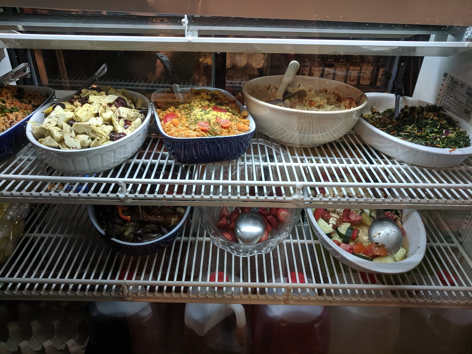 The Gardner's Market deli case filled with house-made salads and sides, from loaded potato salad to kale and pasta salads